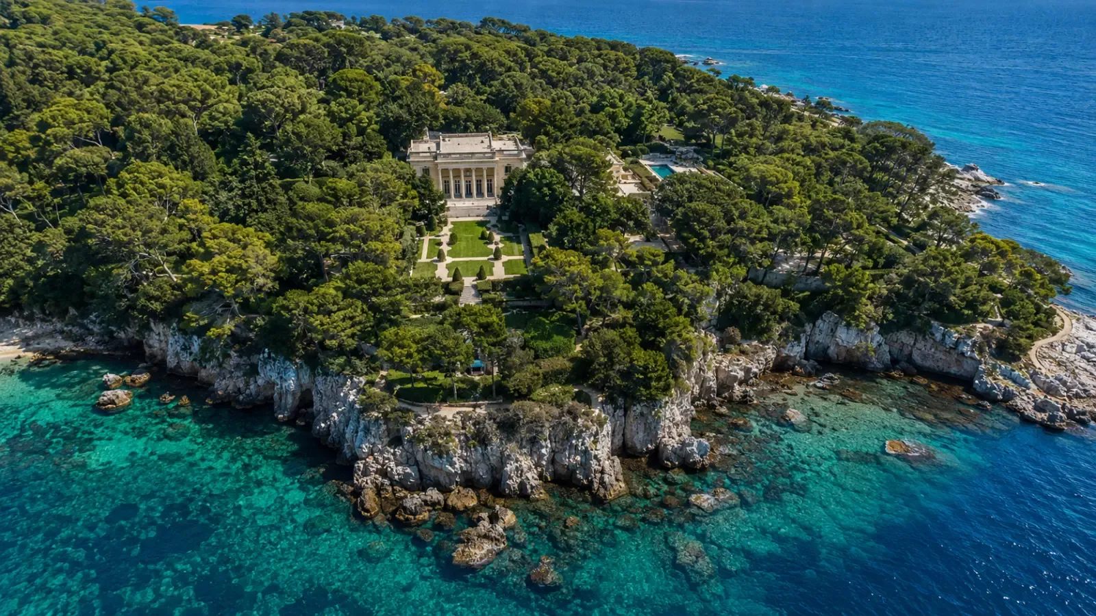 Aerial view of Villa Eilenroc and its gardens above the Mediterranean in Cap d'Antibes