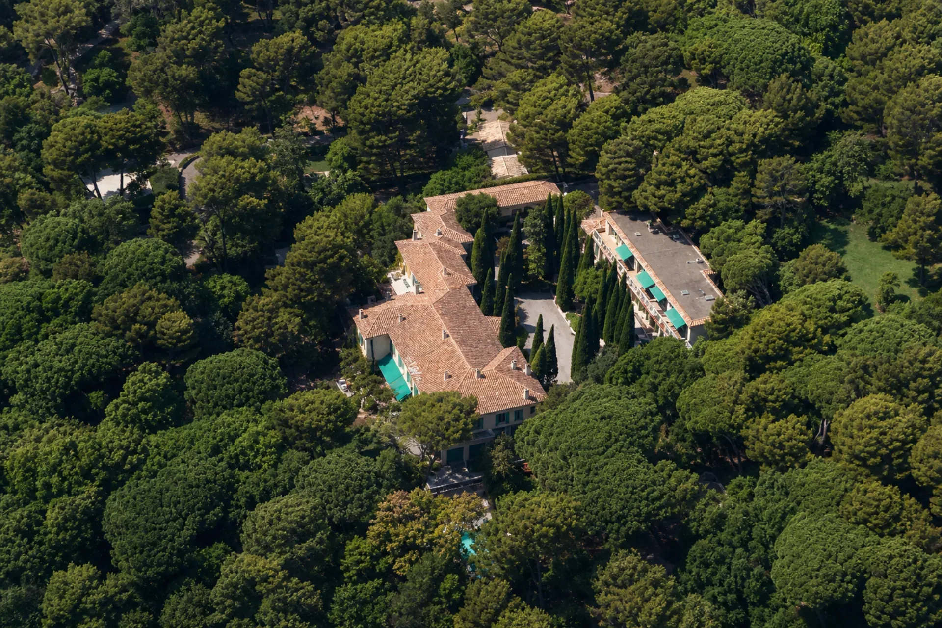 Aerial view of Villa Sous le Vent among the pines of Cap d'Antibes